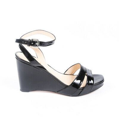 black patent leather wedges