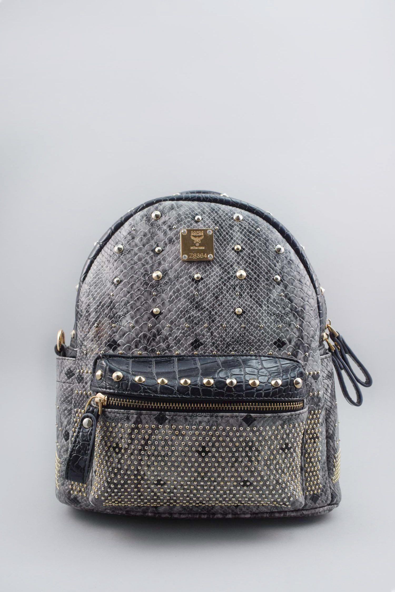 black and grey mcm backpack
