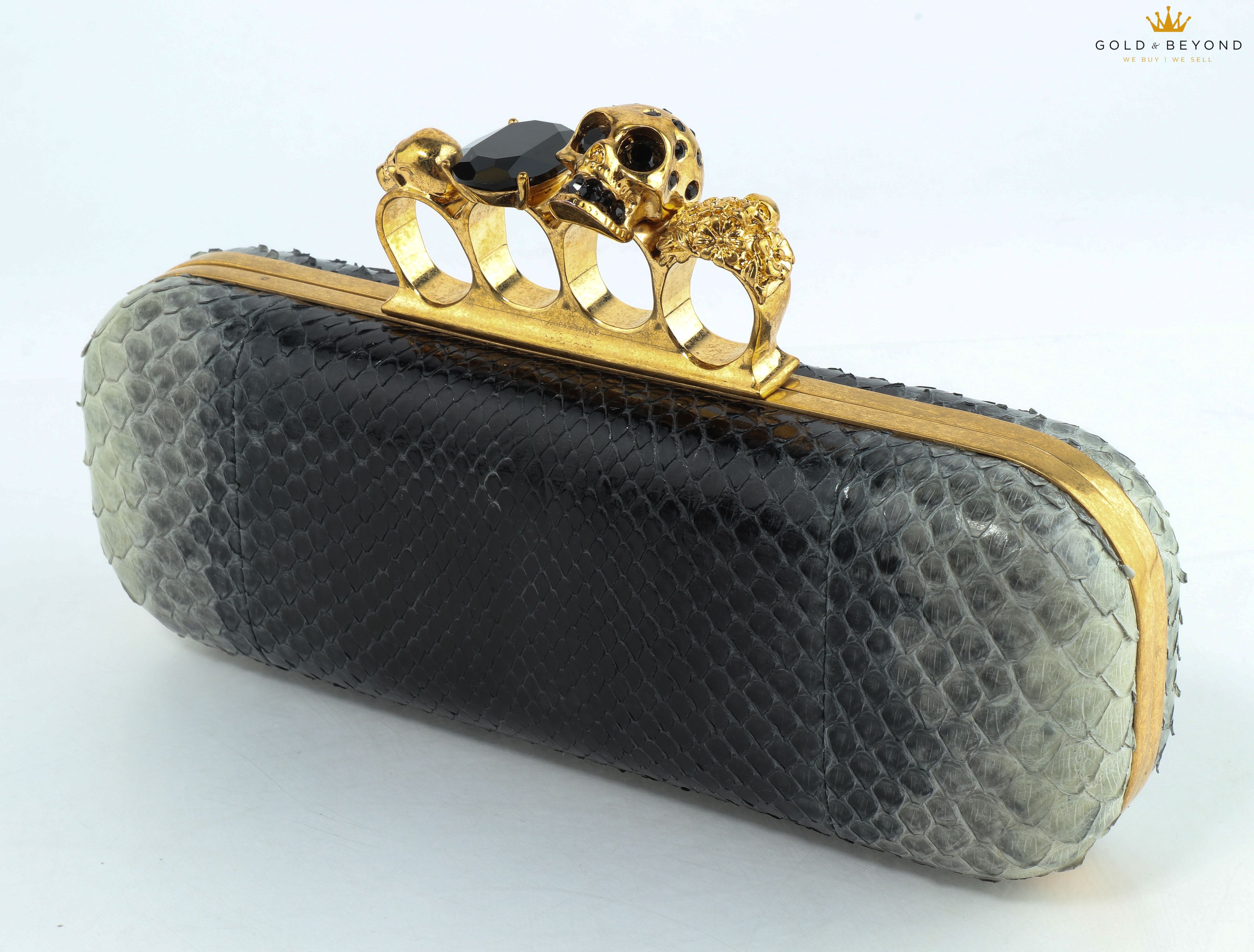 alexander mcqueen four ring clutch