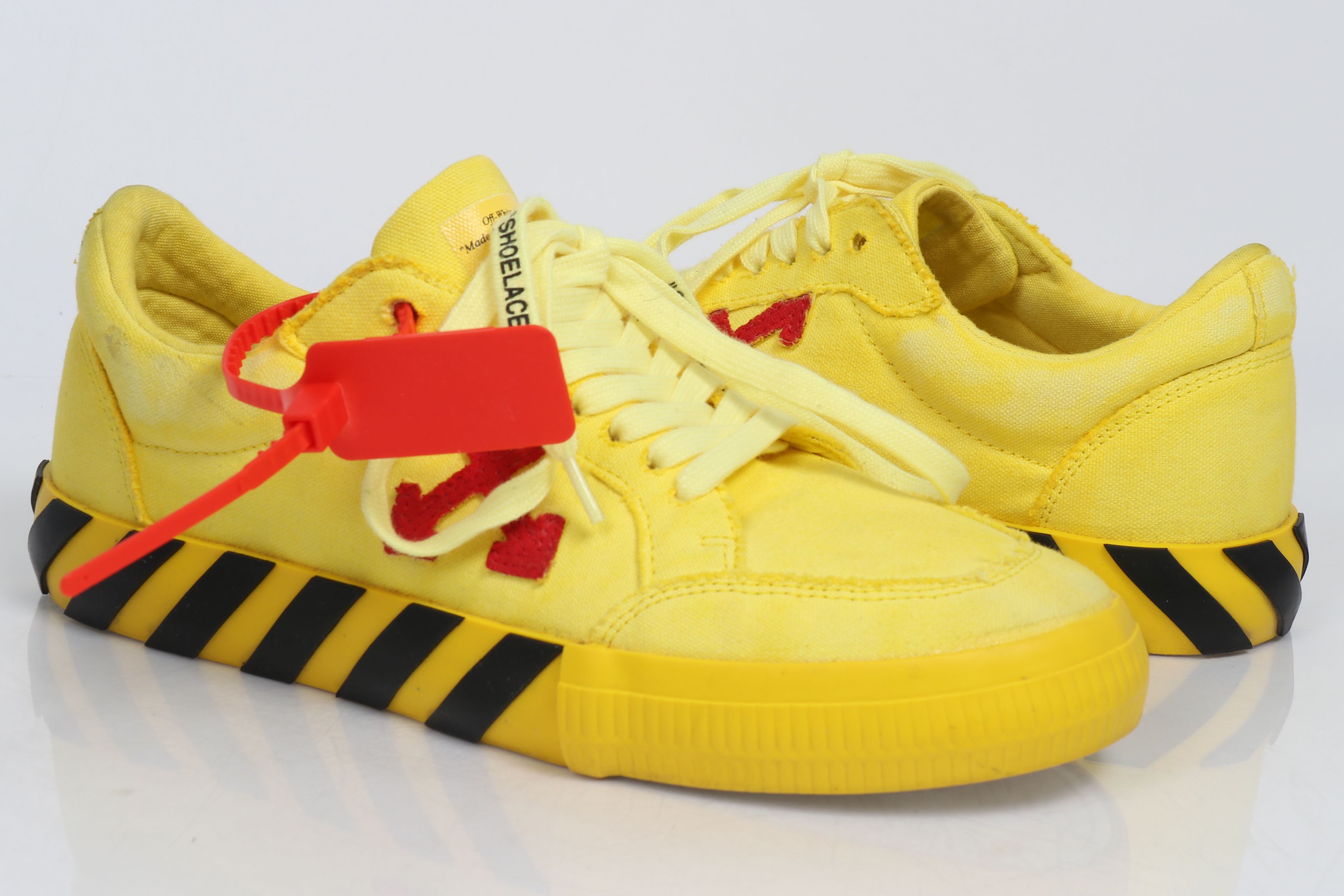 vulcanized low top off white