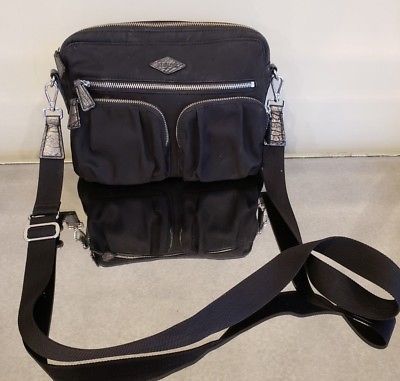 black crossbody bag with silver hardware