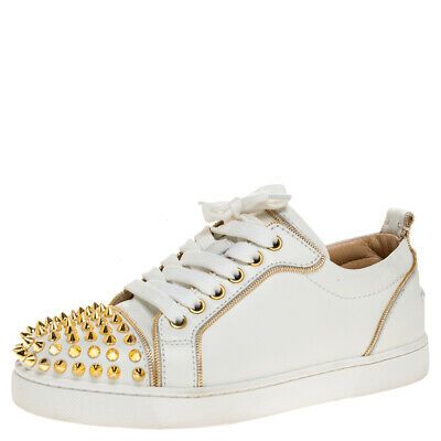 white and gold christian louboutin sneakers