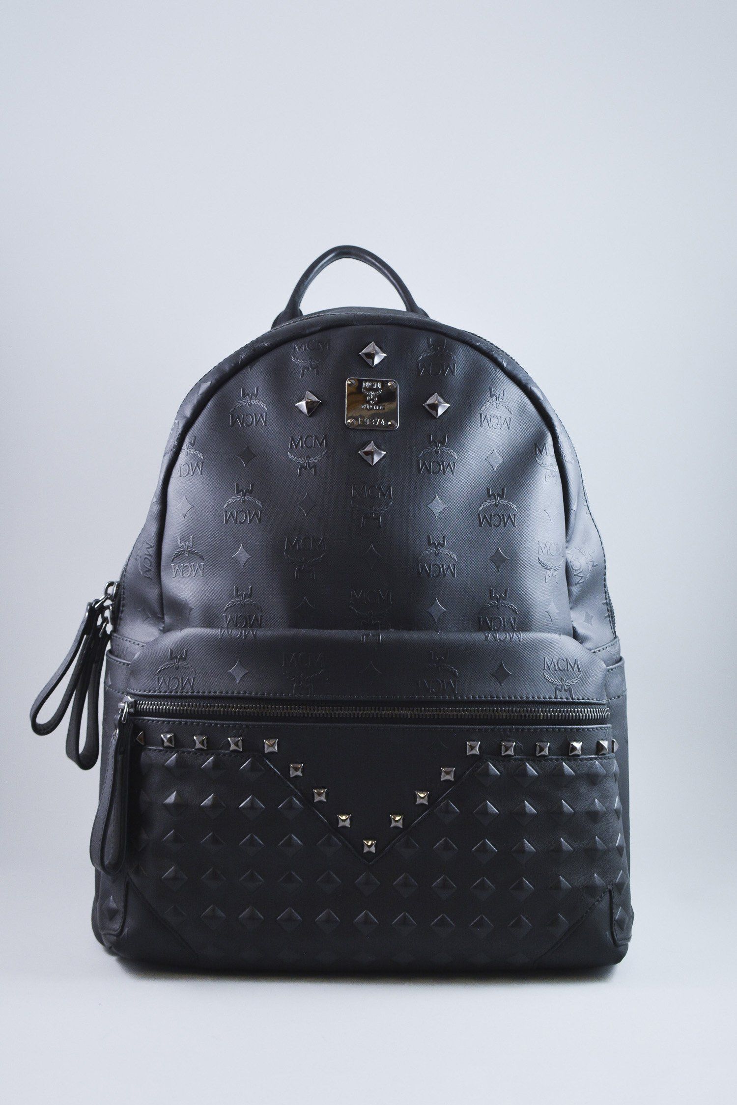 black mcm backpack with studs