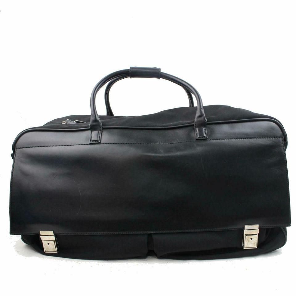 gucci rolling luggage