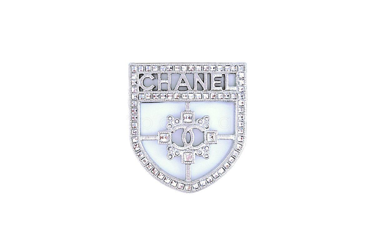 chanel shield brooch